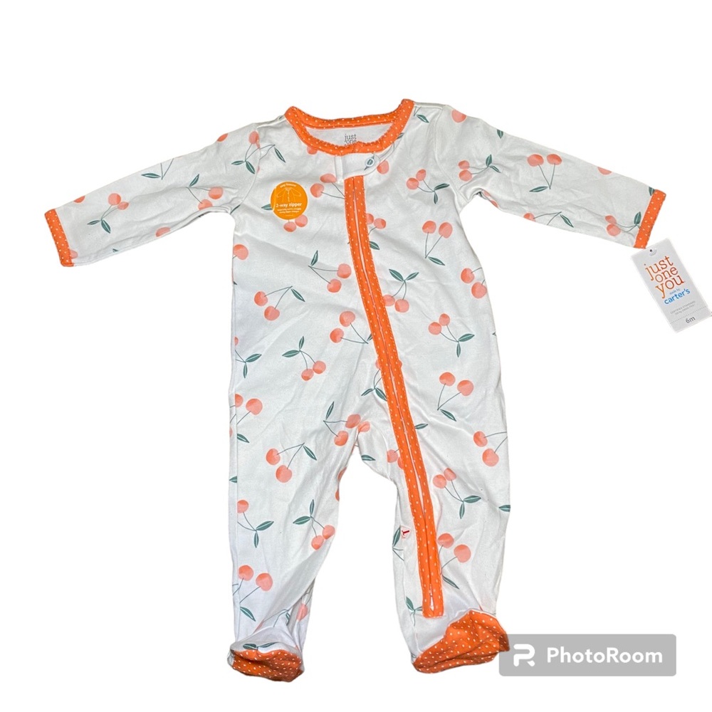 Baby girl onesie. Brand new, tag still attached. 6 months from carters.